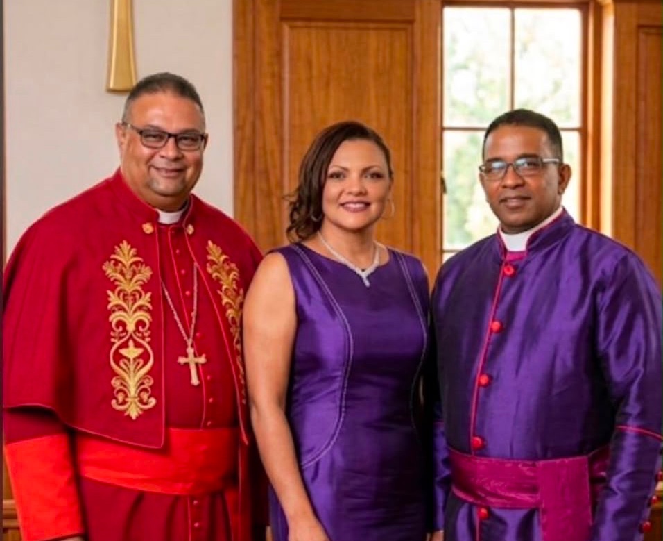 ArchBishop Rennie and his Team